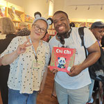 Chinese woman and Black man smiling 