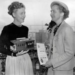 receiving a certificate from Mrs. Hans Klussmann in recognition of her contribution to the "Save the Cable Cars" campaign