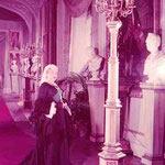entering the set as Queen Victoria