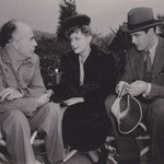 with Gregory LaCava and Patric Knowles on the set of 'Lady In A Jam'