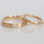 Eheringe 14 kt Rotgold kreisdiamantiert
