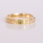 Eheringe 14 kt Gelbgold mit grünem Diamant und graviert