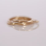 Eheringe 14 kt Rotgold drei verschlungen 