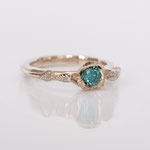 Verlobungsring 14 kt Weissgold mit blauem Diamant