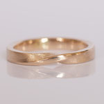 Ehering Möbiusband 14 kt Gelbgold 