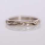 Eheringe 14 kt Weissgold mit Relief und Diamant