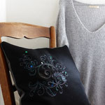 coussin Venu de loin niv.1