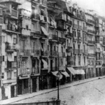 c. 1876 Acera norte de La Ribera desde el puente. A la izquierda puede verse la subida al mismo