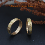 "Luxor" - Eheringe Gelbgold 750, Damenring 1618.- / Herrenring 1710.-