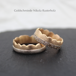 "Panorama" - Eheringe Bicolor Roségold/Weissgold 750, Damenring mit 24 cognacfarben Diamanten 3995.- / Herrenring 2730.-