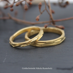 "Layer" - Gelbgold 750, Herrenring 1804.- / Damenring 1496.-