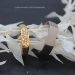 "Wir" Damenring Gelbgold 750 mit 19 Brillanten 2301.- , Herrenring Weissgold 750 2170.-