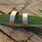 "Lavin" - Eheringe Weissgold 750, Damenring mit kleinem Brillant 2036.-, Herrenring 2495.-