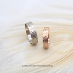 "In line" - Eheringe, Damenring Rotgold 750 1340.-/ Herrenring Weissgold 750 1867.-