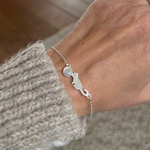 poes kat cat armband kitten ash as dog hond pet huisdier crematie rouw rouwen rouwdienst cremeren afscheid verdriet gemis liefde trouw afscheid loslaten herinnering memory herinngeringssieraad sieraad assieraad memoryjewelry 