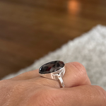 Ring met een stukje textiel. 