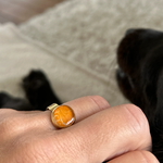 Ring met een stukje postzegel. 