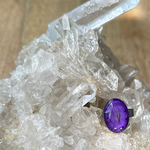Ring met hondenhaar, amethist en wat zilver nuances. 