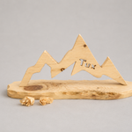 TUX-Berg ; € 36 ; 15cm; INFO: Holz ist ein Naturprodukt, daher können Abweichungen vorkommen.