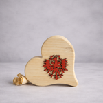 Herz "Tiroler Adler" ; € 20 ; 12cm ; INFO: Holz ist ein Naturprodukt, daher können Abweichungen vorkommen.