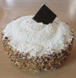 recette du gâteau "succès" Lenôtre . Meringue amandes , crème au beurre et pralin 