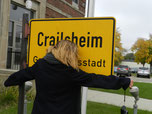 Mein Fotografiekurs hat einen Ausflug gemacht, wir sind am Rathaus vorbei gekommen, wo das Crailsheimschild steht.
