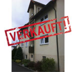 Mehrfamilienhaus mit Grundstück, Garten und Pflanzen
