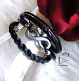 Armband mit Leder   In der Mitte mit einem Infinity / Unendlichkeitszeichen und  2 kleinen Perlen  Material Edelstahl
