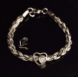 Pferdehaararmband rund, doppelte herzperle