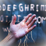 Mit den Händen sehen, Hand mit Energie, Buchstaben