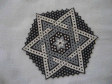 Hand Stitched Black, Silver, and White Star Design Beaded Doily