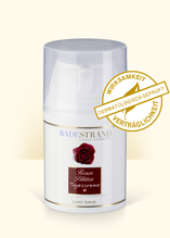 Produktabbildung: „Rosenblüten Tagescreme“,  PE-Vakuumspender, weiß, mit Abdeckkappe 50 ml. Beschriftung „purer Luxus“. Mit „Siegel – Wirksamkeit und Verträglichkeit dermatologisch geprüft“.