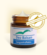 Produktabbildung: „Deo Balsam“ Braunglastiegel 30 ml, geöffnet, Beschriftung „langzeiteffektiv“. Mit „Siegel – Wirksamkeit und Verträglichkeit dermatologisch geprüft“.
