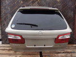На МАЗДУ 626 рестайл универсал, 2000-2002 г.в. - крышка багажника в сборе, со спойлером, оригинал, б у.