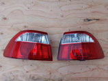 На Мазду 626 рестайл, 2000-2002 г.в., - фонарь левый и правый хрусталь на седан, оригинал, б у. Цена за пару.