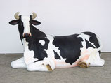 Figura de vaca tumbada | réplicas de vacas - La mejor decoración temática la encontrarás en Mundo Temático.