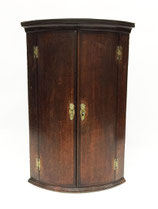 A 19th Century oak hanging corner cupboard