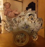 CARROZZA CON PUTTO