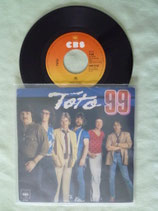 Toto, 99 / r