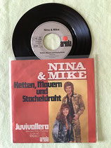 Nina & Mike, Ketten, Mauern und Stacheldraht / sch