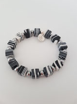 Elastische armband van zebra stenen en zilver gecoated hematiet