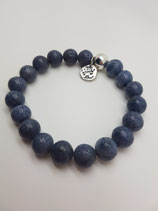 Stoere elastische armband van blauwe koraal met sterling zilver onderdelen