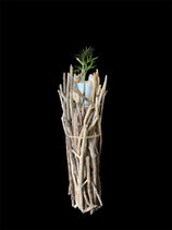 Support en bois flotté pour plante verte