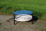 Salontafel met rotan mand en glazen blad