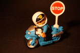 Duplo Polizist auf Motorrad mit Stopschild