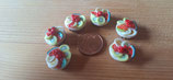 kleine Obsttorteletts mit Melone, Bananen, Erdbeere, Beeren und Kiwi