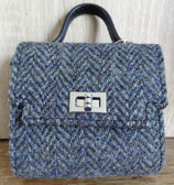 Riemtas Harris Tweed muntentasje