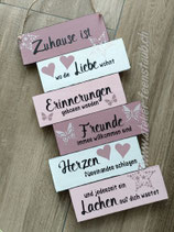 Schild "Zuhause ist, wo die Liebe wohnt..." klein