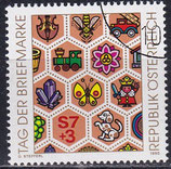 AT 1990 gestempelt