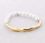 Elastisches Armband aus Stahl mit Perlenimitat